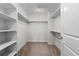 Spacious walk-in closet with custom shelving for ample storage at 188 S Locust St, Denver, CO 80224