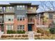 Stylish modern townhome featuring brick facade and large windows at 188 S Locust St, Denver, CO 80224