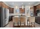 Modern kitchen featuring stainless steel appliances and granite countertops at 188 S Locust St, Denver, CO 80224
