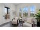 Inviting seating area bathed in natural light from large windows at 188 S Locust St, Denver, CO 80224