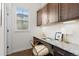 Bright office with built-in desk and ample cabinet space at 188 S Locust St, Denver, CO 80224