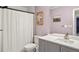 Bathroom with a vanity, mirror, and shower curtain at 7192 S Vine E Cir, Centennial, CO 80122