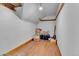 Unfinished attic with exposed beams and ample storage space at 7011 Grandview Ave, Arvada, CO 80002