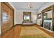 Living room highlighting a fireplace, hardwood floors, and vintage accents throughout at 7011 Grandview Ave, Arvada, CO 80002
