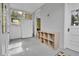 Bright mudroom with storage cubbies and access to the outdoors at 7011 Grandview Ave, Arvada, CO 80002