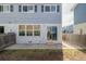 Backyard featuring a sliding glass door and cement patio at 11141 Gaylord St, Northglenn, CO 80233