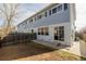 Backyard featuring a sliding glass door and cement patio at 11141 Gaylord St, Northglenn, CO 80233