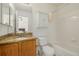 Bathroom featuring tile flooring, shower, vanity, and a cabinet at 11141 Gaylord St, Northglenn, CO 80233