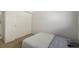 Cozy bedroom featuring a closet with sliding doors and natural light at 11141 Gaylord St, Northglenn, CO 80233