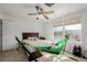 Bedroom with a ceiling fan, carpet, and a hammock at 11141 Gaylord St, Northglenn, CO 80233