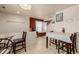 Bright dining area with tile flooring, and adjacent dining area at 11141 Gaylord St, Northglenn, CO 80233