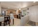 Bright kitchen with stainless steel appliances, ample cabinet space, and adjacent dining area at 11141 Gaylord St, Northglenn, CO 80233