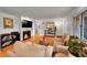 Cozy living room featuring hardwood floors, a fireplace, and comfortable seating at 1935 Oneida St, Denver, CO 80220