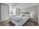 Cozy bedroom featuring a comfortable bed, soft lighting, and neutral decor at 6769 E Costilla Cir, Centennial, CO 80112