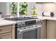 Stainless steel oven and gas cooktop with light countertops and light brown cabinets at 6769 E Costilla Cir, Centennial, CO 80112