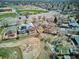 Aerial view of the neighborhood with houses and landscaping from above at 1281 S Allison St, Lakewood, CO 80232
