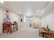 Finished basement with a large open area, suitable for recreation and a separate play area at 1281 S Allison St, Lakewood, CO 80232