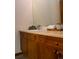 Bathroom featuring a single sink vanity, spacious counter and updated fixtures at 4315 Bella Vista Dr, Longmont, CO 80503