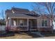 Charming home featuring a welcoming front porch, neat landscaping, and a classic architectural design at 4315 Bella Vista Dr, Longmont, CO 80503