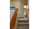 Upstairs hallway with carpeted stairs and view of a bedroom space with seating at 4315 Bella Vista Dr, Longmont, CO 80503