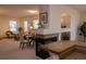 Bright and airy living room featuring modern fireplace, neutral walls, and comfortable seating arrangement at 4315 Bella Vista Dr, Longmont, CO 80503
