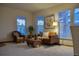 Bright living room featuring large windows, plush seating, and stylish decor at 4315 Bella Vista Dr, Longmont, CO 80503