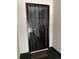 Exterior image of a secure black metal security door and frame at 10792 E Exposition Ave # 352, Aurora, CO 80012