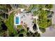Aerial view of the property showcases the pool, jacuzzi, patio, landscaping and the home's roof at 5345 S Race Ct, Greenwood Village, CO 80121