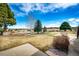 Expansive backyard with mature trees and landscaping, perfect for outdoor living and entertaining at 6936 S Chapparal W Cir, Centennial, CO 80016