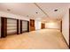 Expansive basement area with large built-in storage closets and open space, perfect for customization at 6936 S Chapparal W Cir, Centennial, CO 80016