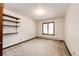 Bedroom featuring a window and some shelving, ready for your decor and personal touch at 6936 S Chapparal W Cir, Centennial, CO 80016