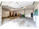 Spacious garage with high ceilings and ample room for parking and storage, ready for organization at 6936 S Chapparal W Cir, Centennial, CO 80016