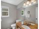 This bathroom features a dual sink vanity with granite counters and great lighting at 1250 S Boyero Ct, Superior, CO 80027