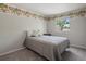 This bedroom features a neutral color palette and carpeted floors at 1250 S Boyero Ct, Superior, CO 80027