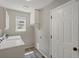 This laundry room is equip with modern appliances, great storage, and natural light at 1250 S Boyero Ct, Superior, CO 80027