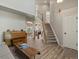 Open living room featuring beautiful wood floors, staircase, and ample natural light at 1250 S Boyero Ct, Superior, CO 80027