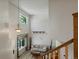 Upstairs view of a bright living area with high ceilings, modern lighting, and stylish decor at 1250 S Boyero Ct, Superior, CO 80027