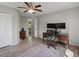 This office features a ceiling fan, a desk, and dual monitors at 1250 S Boyero Ct, Superior, CO 80027