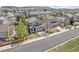 Aerial view showcasing a two-story home with mature trees in a residential neighborhood on a sunny day at 3116 Black Canyon Way, Castle Rock, CO 80109