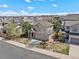 Aerial view of neighborhood featuring a large two story home with mature trees and well-manicured front yard at 3116 Black Canyon Way, Castle Rock, CO 80109