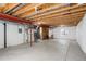 Unfinished basement with exposed beams and duct work offers a blank canvas to create a unique space at 3116 Black Canyon Way, Castle Rock, CO 80109