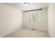 Simple and clean bedroom with a window providing natural light and neutral carpet at 3116 Black Canyon Way, Castle Rock, CO 80109