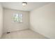 Clean bedroom with a window providing natural light and neutral carpet at 3116 Black Canyon Way, Castle Rock, CO 80109