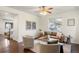 Bright living room featuring hardwood floors, neutral walls and stylish furnishings at 3116 Black Canyon Way, Castle Rock, CO 80109