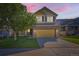 Charming two-story home with a well-manicured front yard, covered porch and inviting exterior at 3802 Chaffee Ct, Castle Rock, CO 80109