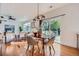 Open-concept living area with hardwood floors, seamless transition to outdoor deck at 3802 Chaffee Ct, Castle Rock, CO 80109