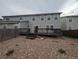 A spacious backyard area with a wooden deck perfect for outdoor entertaining and relaxation at 9322 Jackson St, Thornton, CO 80229