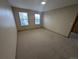 Spacious bedroom with neutral carpet and natural light from large windows at 9322 Jackson St, Thornton, CO 80229