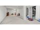 Unfinished basement featuring white concrete walls and floors ready for renovation at 2742 S Xanadu Way, Aurora, CO 80014