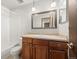 Bathroom with a vanity, sink, toilet, and bathtub with shower at 2742 S Xanadu Way, Aurora, CO 80014
